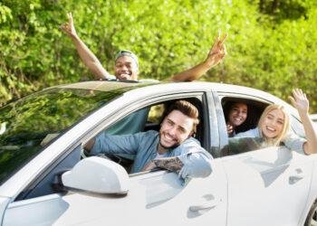 cheerful young diverse friends riding their car l 2025 03 18 18 44 26 utc scaled